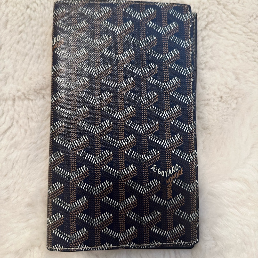 Goyard blue wallet.